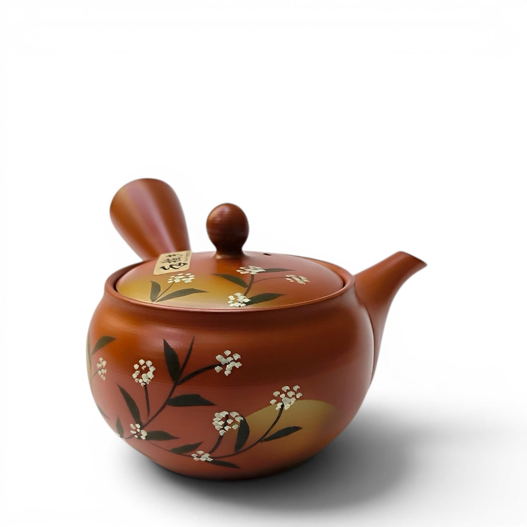 Original japanische Seitengriffkanne aus Tokoname-Ton mit Teepflanzenmotiv