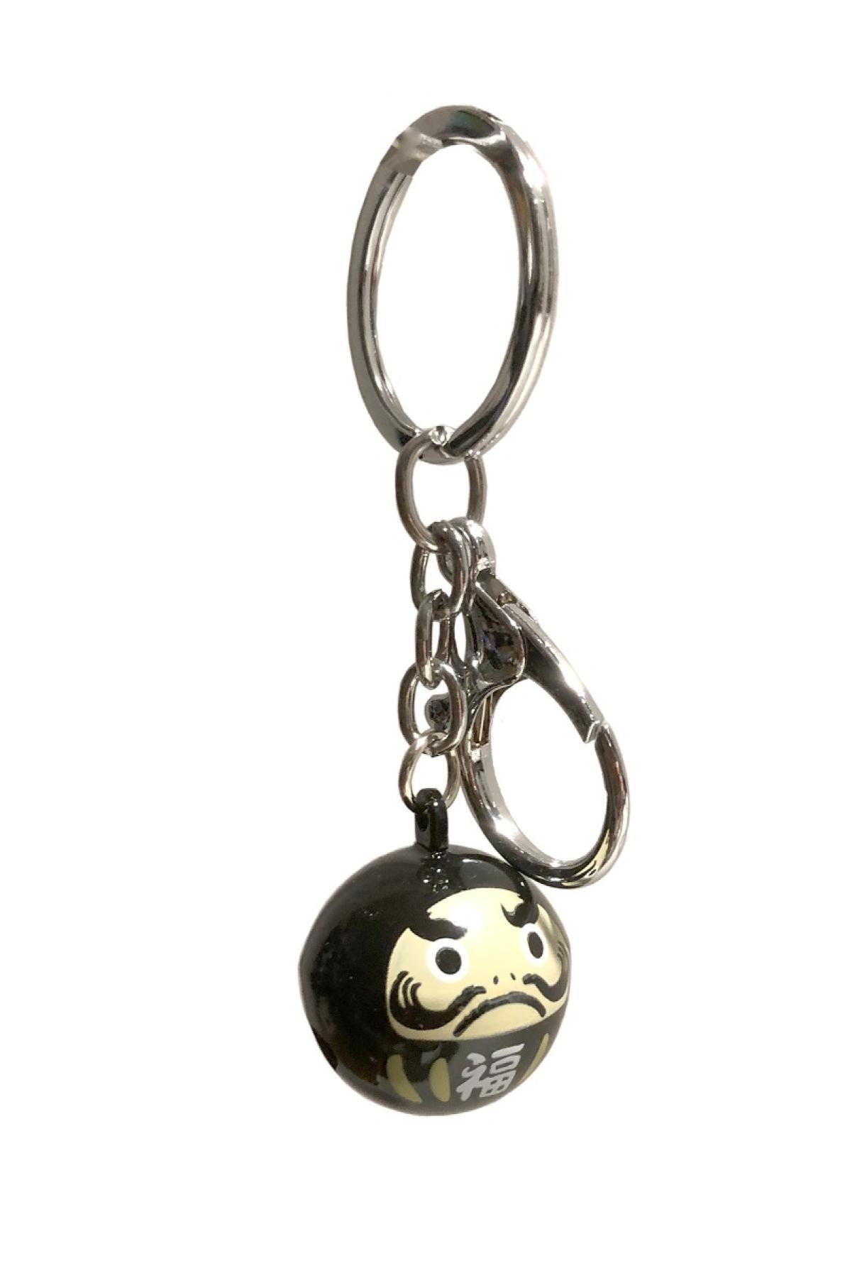 Schwarzer Daruma Schlüsselanhänger aus Japan